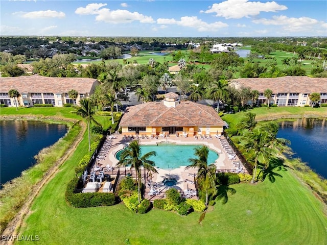 drone / aerial view with a water view