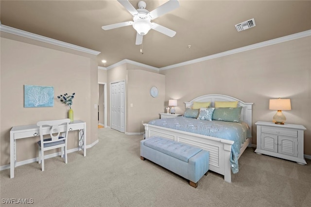 carpeted bedroom with crown molding, baseboards, visible vents, and ceiling fan