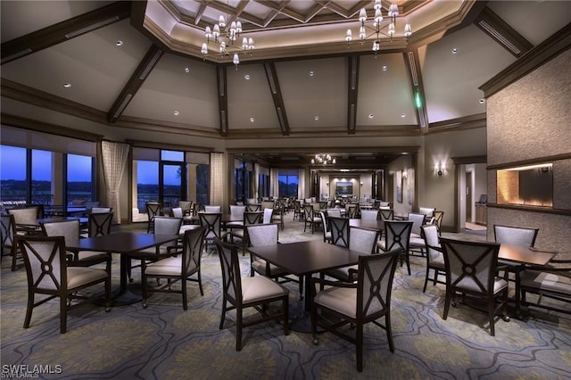 dining room featuring beam ceiling, a towering ceiling, coffered ceiling, and a chandelier