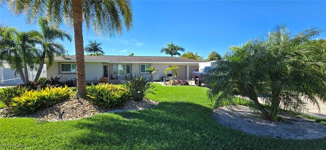 view of front of property featuring a front yard and stucco siding