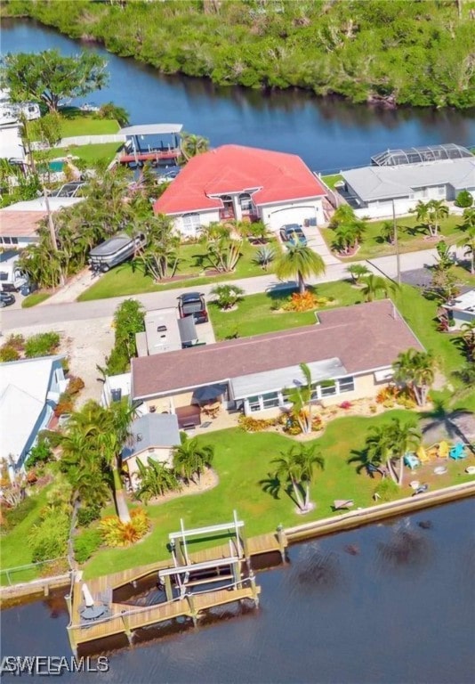 aerial view featuring a water view and a residential view