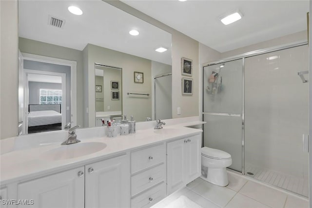 ensuite bathroom featuring ensuite bath, a stall shower, tile patterned flooring, and a sink