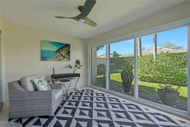 interior space featuring a ceiling fan