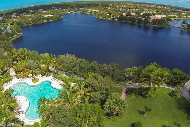 birds eye view of property with a water view