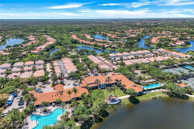 bird's eye view with a water view and a residential view