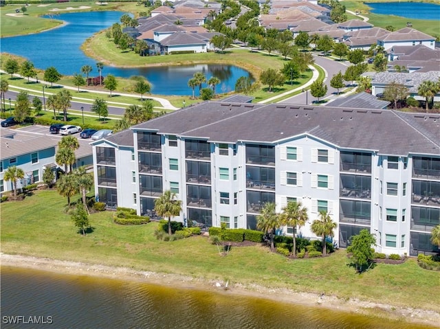 drone / aerial view with a water view
