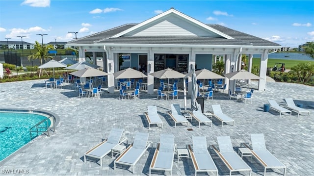 community pool with a patio