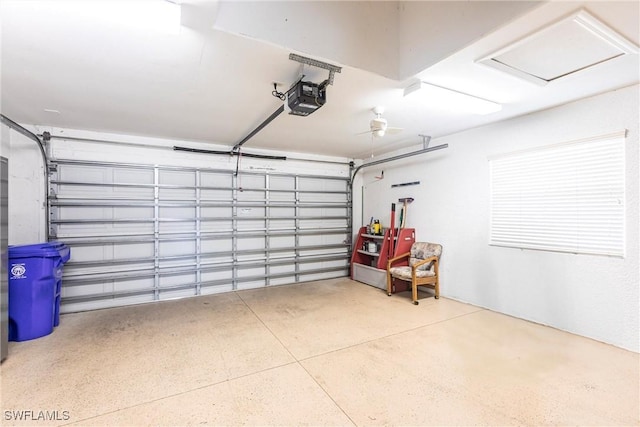 garage featuring a garage door opener