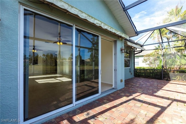 view of patio / terrace with a lanai