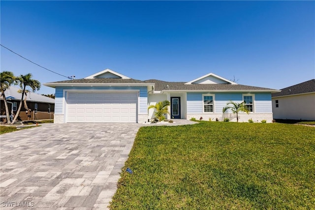 ranch-style home with a garage, decorative driveway, and a front lawn