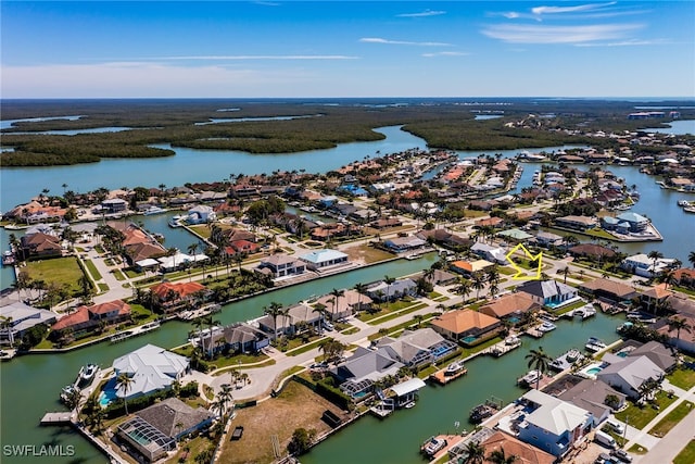 aerial view featuring a residential view and a water view