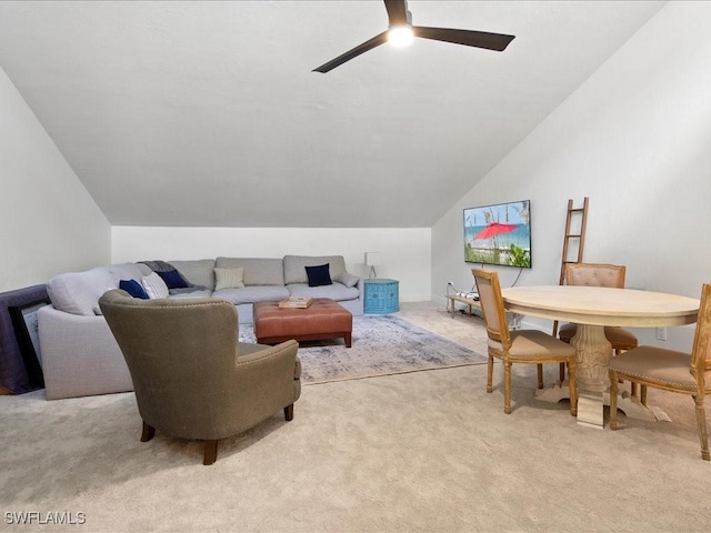 living room featuring lofted ceiling, light carpet, and ceiling fan