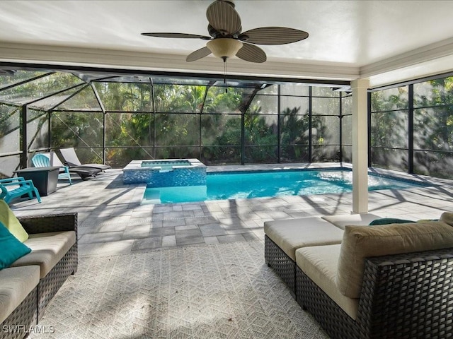 view of pool with glass enclosure, a patio area, and a pool with connected hot tub