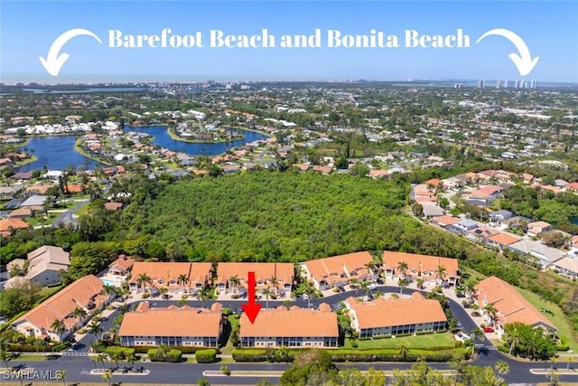 28621 Carriage Home Dr Unit 204, Bonita Springs, FL 34134 - aerial perspective of suburban area with a nearby body of water