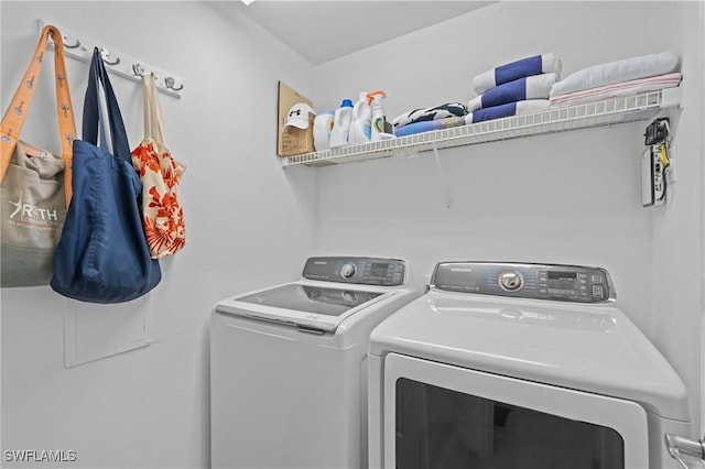 laundry area with independent washer and dryer and laundry area