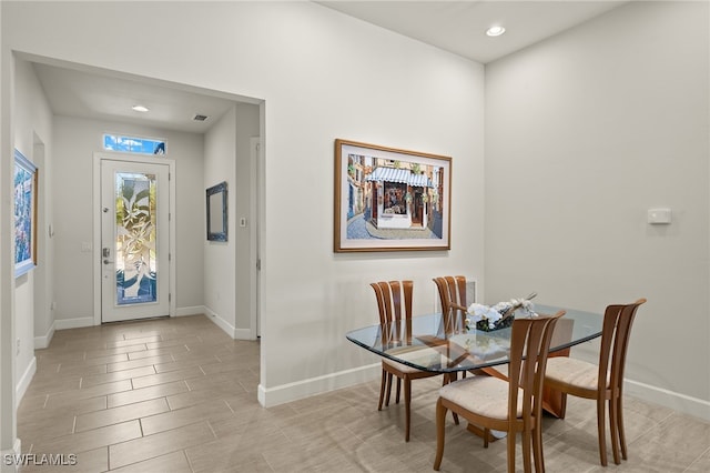 dining room with visible vents, recessed lighting, baseboards, and wood finish floors