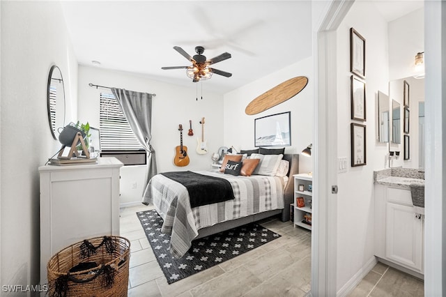 bedroom with baseboards and ceiling fan