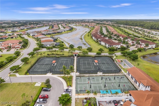 bird's eye view featuring a residential view and a water view