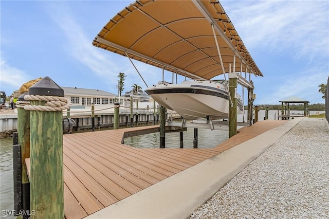 view of dock with boat lift