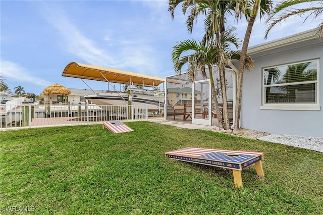 view of yard featuring a lanai