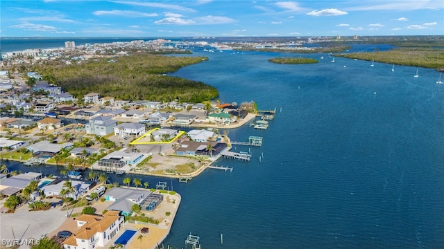 birds eye view of property with a residential view and a water view