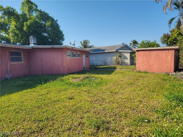 view of yard with fence