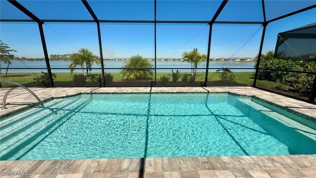 outdoor pool featuring a lanai and a water view