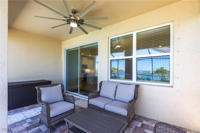 view of patio featuring outdoor lounge area and ceiling fan