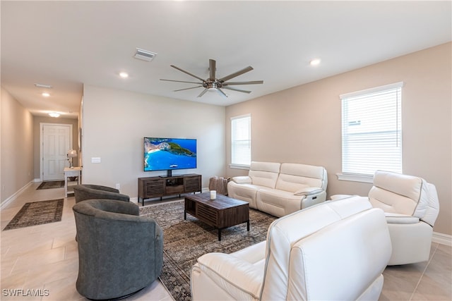 living room featuring light tile patterned floors, recessed lighting, visible vents, and a ceiling fan