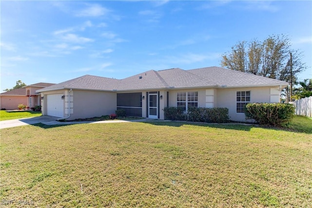 single story home with an attached garage, fence, driveway, stucco siding, and a front yard