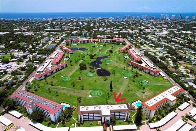 birds eye view of property with golf course view