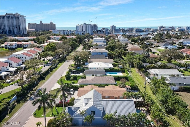 birds eye view of property featuring a city view