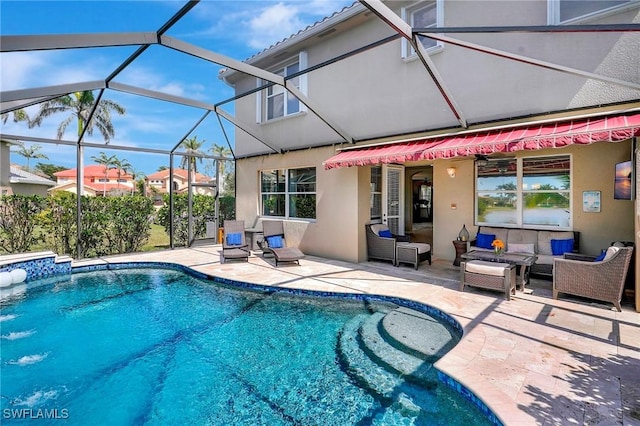 outdoor pool with outdoor lounge area and a patio
