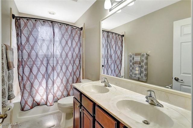 full bath with a sink, shower / bathtub combination with curtain, double vanity, and toilet