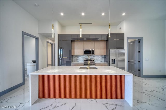 kitchen with appliances with stainless steel finishes, marble finish floor, decorative backsplash, and modern cabinets