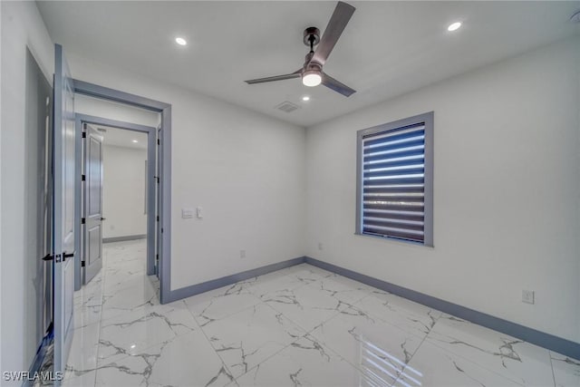 interior space featuring recessed lighting, visible vents, a ceiling fan, baseboards, and marble finish floor