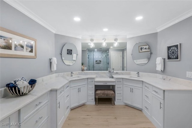 full bath with ornamental molding, recessed lighting, a shower stall, and wood finished floors