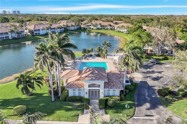 aerial view featuring a water view and a residential view