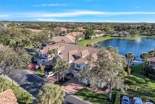 aerial view featuring a water view and a residential view