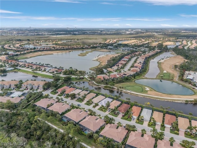 birds eye view of property featuring a residential view and a water view