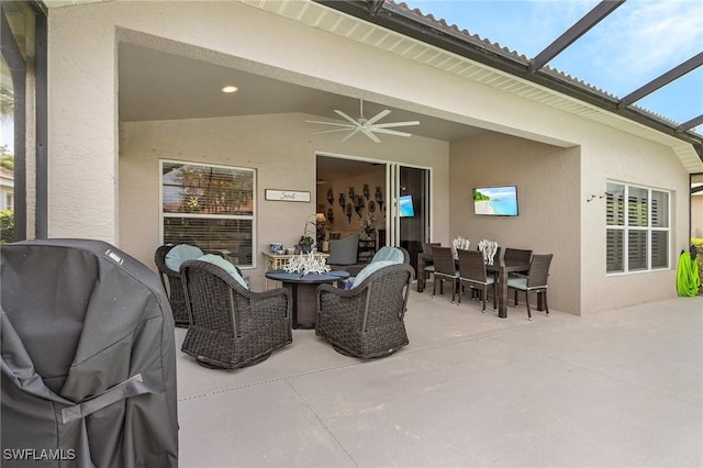 view of patio / terrace featuring ceiling fan, grilling area, outdoor dining area, an outdoor hangout area, and a lanai