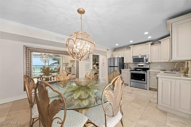 dining space featuring recessed lighting, visible vents, ornamental molding, a chandelier, and baseboards