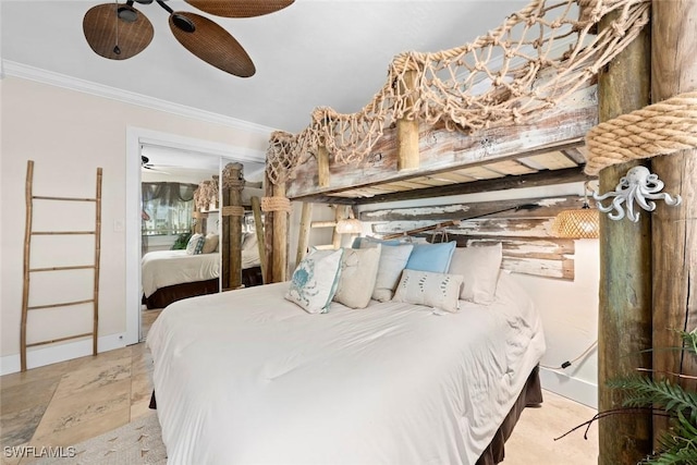 bedroom with crown molding, baseboards, and ceiling fan