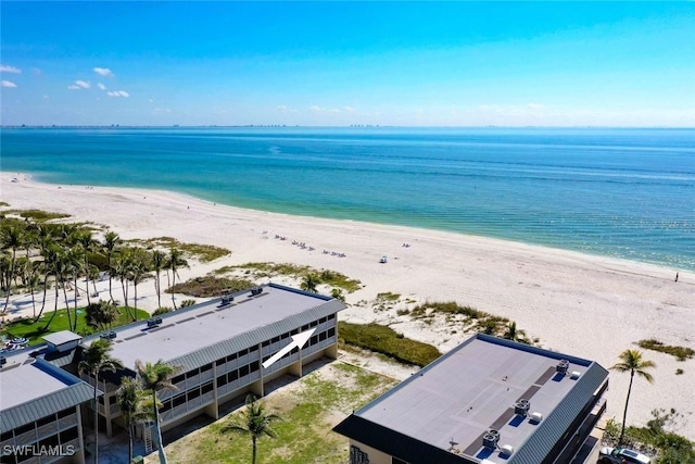 bird's eye view with a water view and a view of the beach