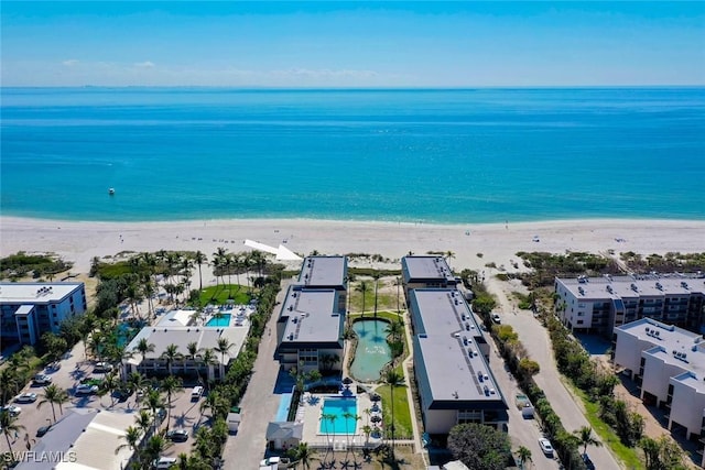 drone / aerial view with a view of the beach and a water view