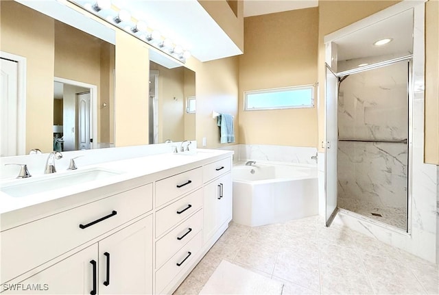 full bathroom featuring double vanity, a sink, a marble finish shower, and a bath