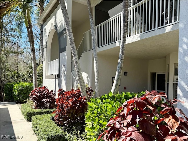 view of property exterior with stucco siding