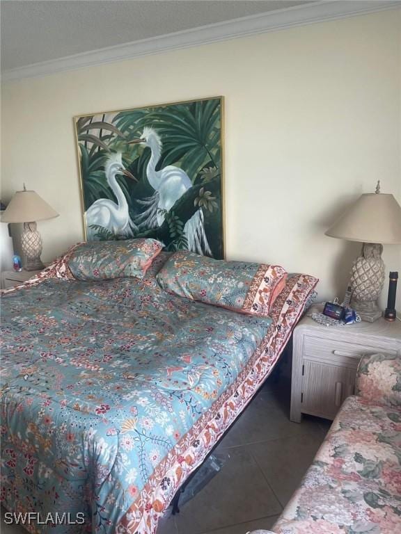 bedroom featuring crown molding