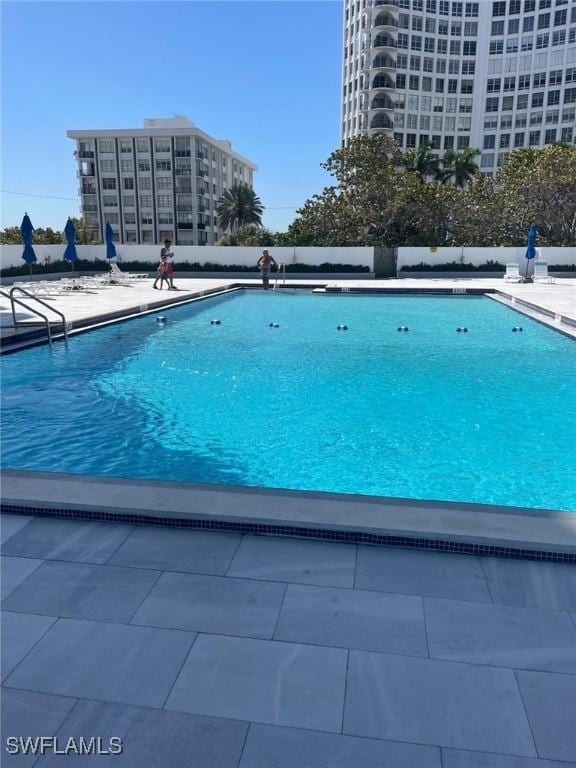 pool with a patio