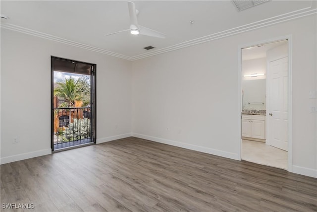 unfurnished room featuring light wood finished floors, visible vents, baseboards, ceiling fan, and ornamental molding